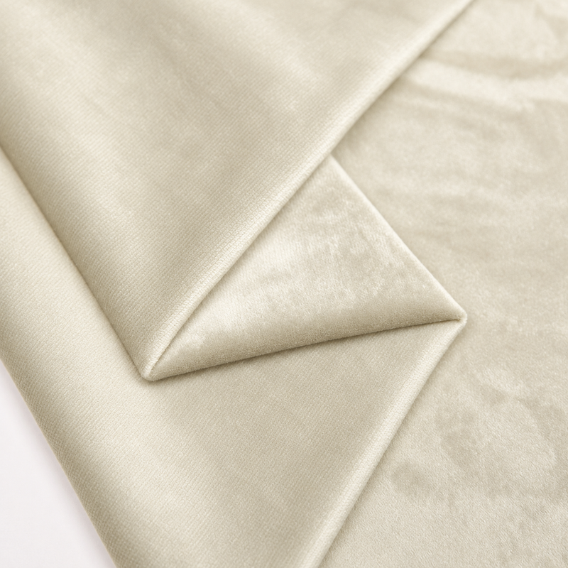Cream plush velvet fabric close-up