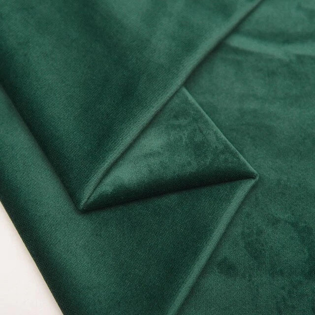 Emerald Green plush velvet fabric close-up