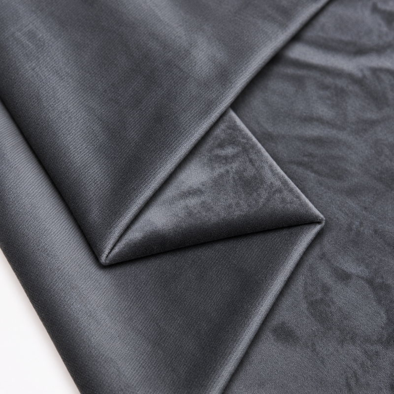 Grey plush velvet fabric close-up