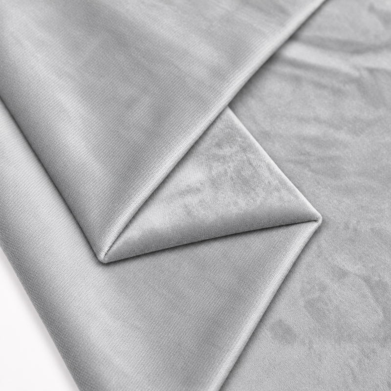 Silver plush velvet fabric close-up