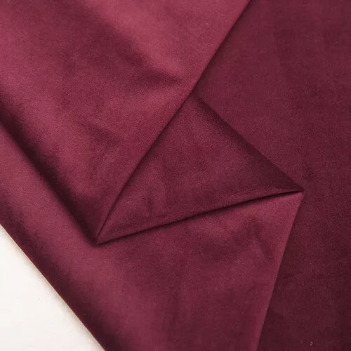 Wine plush velvet fabric close-up